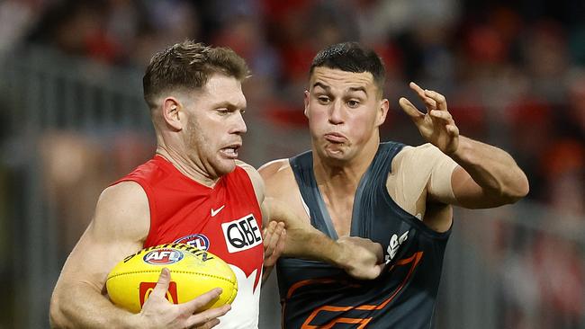 Sydney's Taylor Adams and Giants Finn Callaghan during the Round 15 AFL Sydney Derby between the GWS Giants and Sydney Swans at Engoe Stadium on June 22, 2024. Photo by Phil Hillyard(Image Supplied for Editorial Use only - **NO ON SALES** - Â©Phil Hillyard )