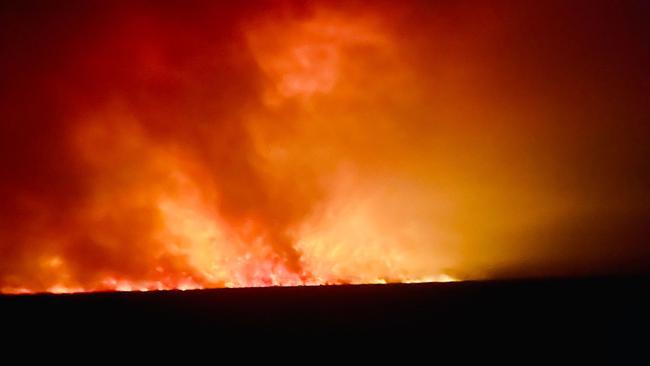 An uncontrolled blaze continues to burn in the Barkly region, with the fire triple the size of the Australian Capital Territory.