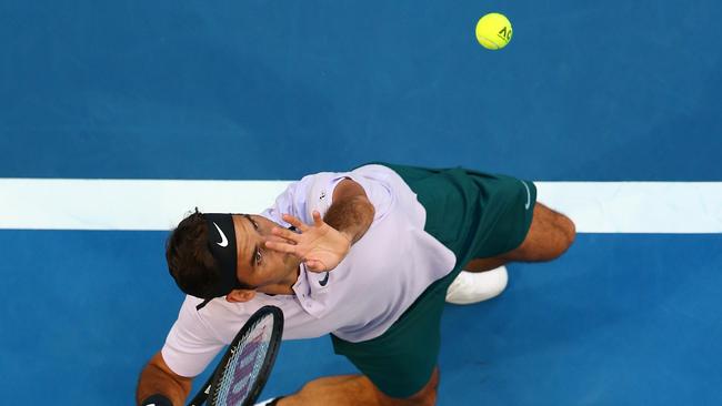 Roger Federer of Switzerland serves in his 2018 Hopman Cup match against Yuichi Sugita of Japan.