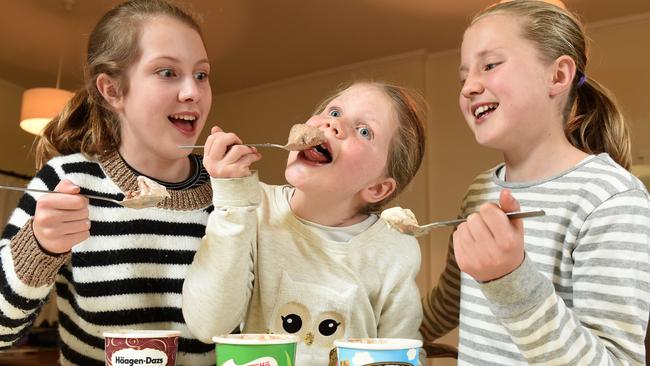 Sisters Emily, 13, Zoe, 9 and Georgia, 11 enjoy ice cream. Picture: Kylie Else