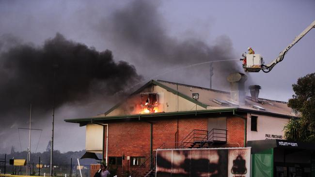 A cherry picker was used to help fight the flames. Picture: Scott Powick.