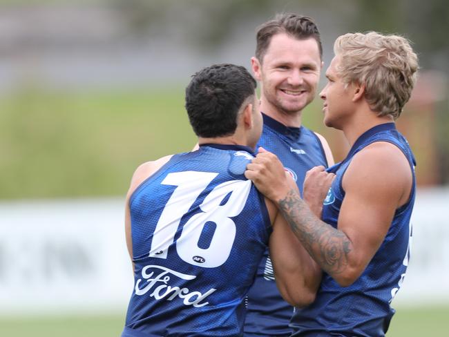 Tyson Stengle, Patrick Dangerfield and Quinton Narkle at Geelong training.