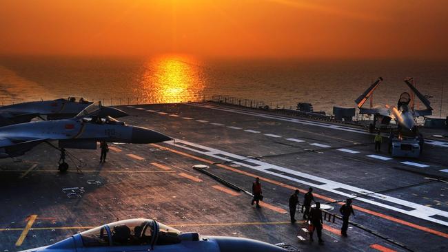 Chinese F-15 ‘Flying Shark’ fighters on the deck of the aircraft carrier Liaoning. Picture: Supplied