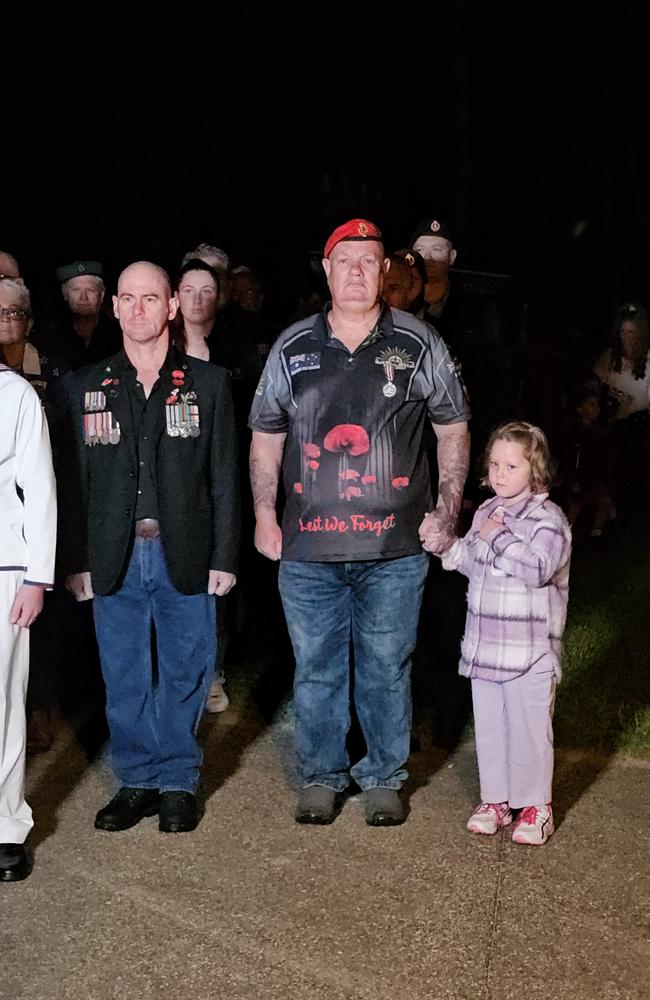 Clinton Stannard with his granddaughter Gracie Dangerfield at the Half Tide Dawn Service at Hay Point. Mackay Anzac Day 2025. Photo: Janessa Ekert