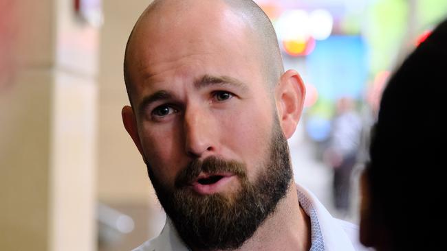 MELBOURNE AUSTRALIA - NewsWire Photos NOVEMBER 8, 2024: Prominent neo-Nazi Thomas Sewell talks to members of the media outside the Melbourne Magistrates Court.Picture: NewsWire / Luis Enrique Ascui