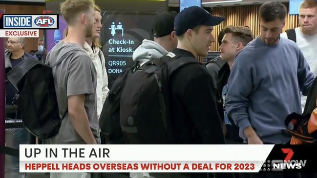 Essendon players at Melbourne Airport ahead of their trip.