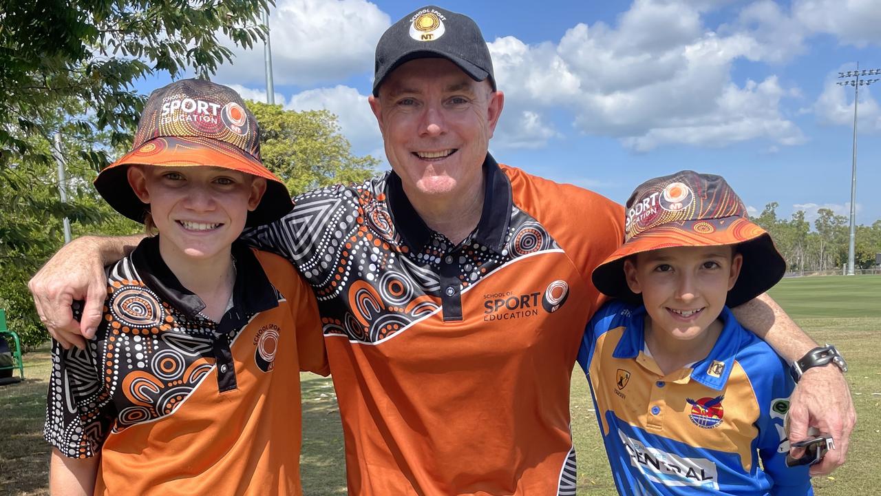 Northern Territory Under-12 boys captain Tye Beer, coach Chris McCormick and the youngest player in the side William Handford.