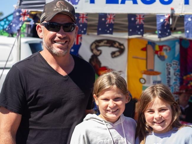 Saija and dad Chris with their friend Stella at the Moore Park Beach Arts Festival