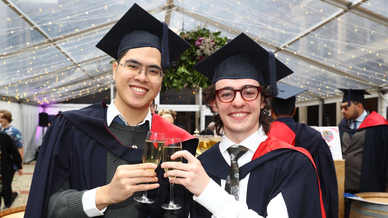 Deakin graduates Bao Lan Han and Lindsay Davies. Picture: Alison Wynd