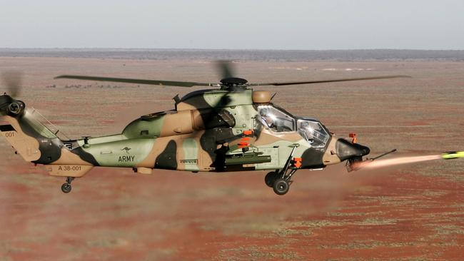 LIVE FIRE: A Tiger helicopter test-fires a Hellfire missile at the Woomera range.