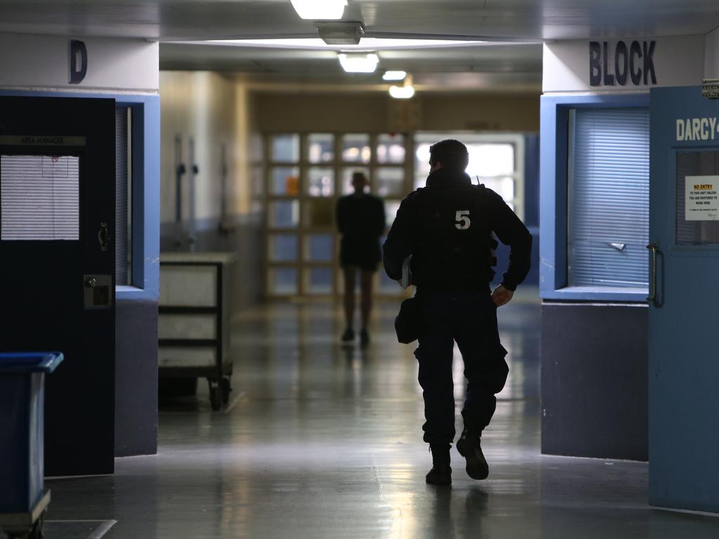 A Correctional Services officer patrols the hallways at Silverwater Correction Centre. Picture: Tim Hunter