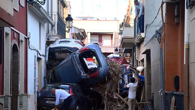 Debris fills a street in the town of Paiporta, in the region of Valencia. Picture: AFP.