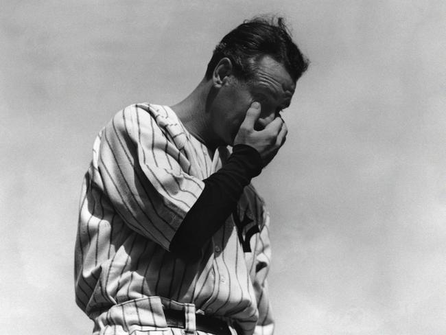 New York Yankees star Lou Gehrig wipes away a tear during a sold-out tribute at Yankee Stadium on July 4, 1939.