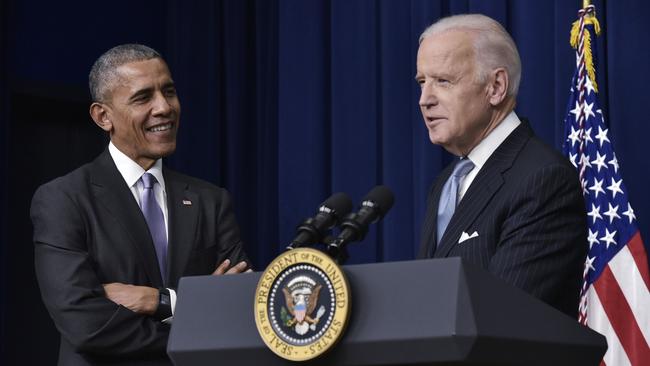 Then-US Vice President Joe Biden, right speaks, watched by then-US President Barack Obama, in 2016. Picture: AFP