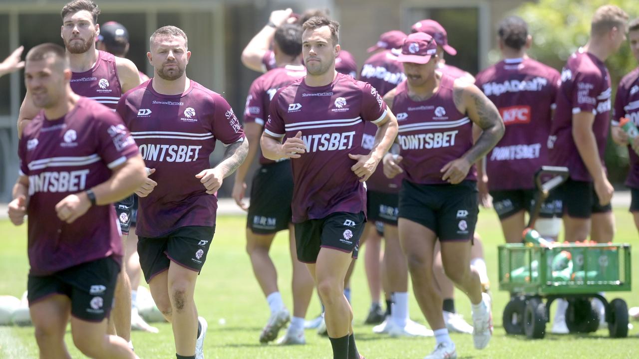 New signings Luke Brooks (c) and Nathan Brown (3L) at Manly pre-season training. Picture: Jeremy Piper