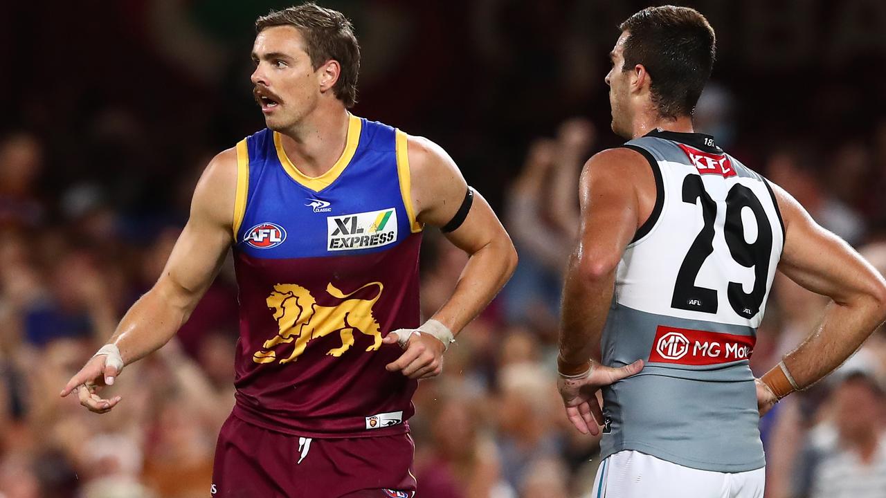 BRISBANE, AUSTRALIA - MARCH 19: Joe Daniher of the Lions celebrates a goal during the round one AFL match between the Brisbane Lions and the Port Adelaide Power at The Gabba on March 19, 2022 in Brisbane, Australia. (Photo by Chris Hyde/Getty Images)