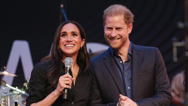 Prince Harry, Duke of Sussex and Meghan, Duchess of Sussex speak on stage at the Invictus Games in September. Picture: Chris Jackson/Getty Images