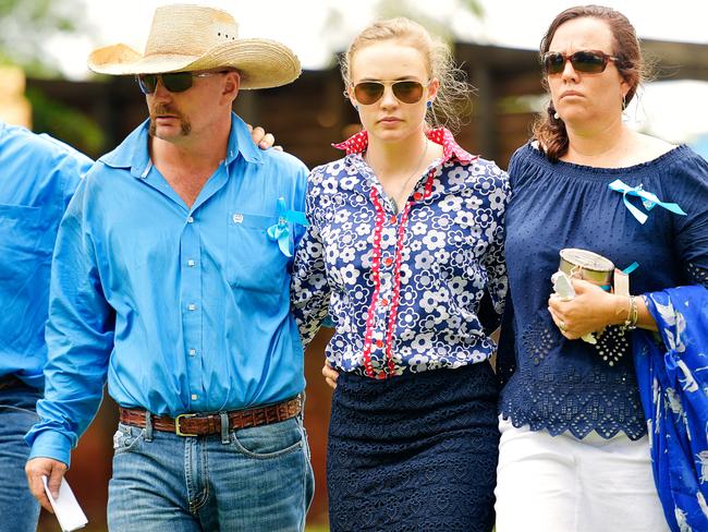 Tick Everett, Meg Everett, and Kate Everett surrounded by family at Casuarina Street Primary School after Dolly Everett's memorial service in Katherine, Northern Territory.