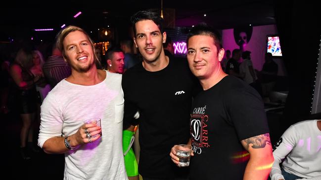 Bachie’s Sam Cochrane (left) and Jake Ellis with Brademn Quan at Love Nightlife in Broadbeach. Photo: Pedro Silva