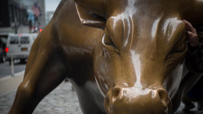 US stocks set new records in the final days of 2021. (Photo by Bryan R. Smith / AFP)