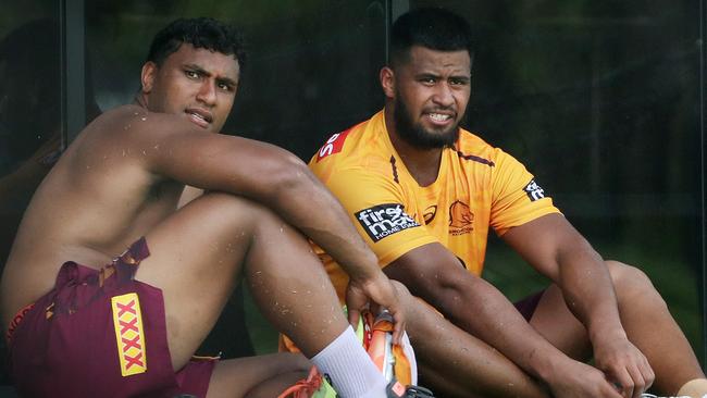 Payne Haas taking his boots off after training with the team, Brisbane Broncos training, Red Hill. Photographer: Liam Kidston.