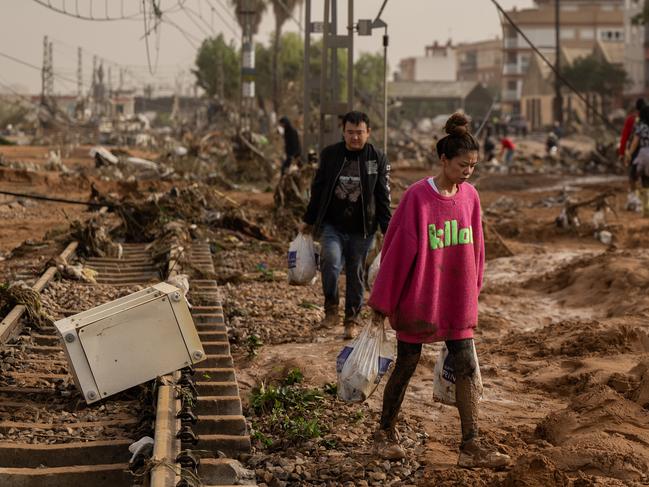 Train tracks are covered debris after flash-flooding in Valencia, Spain. Picture: Getty Images