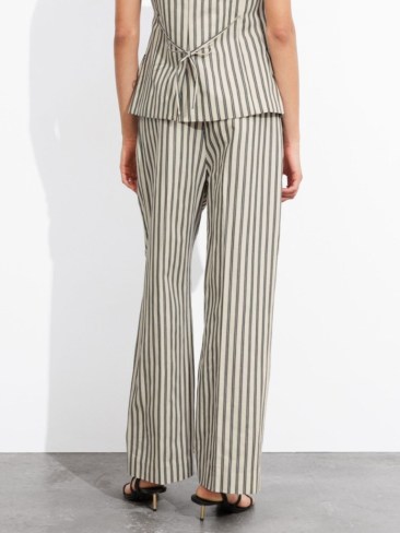 & Other Stories Tailored Strappy Waistcoat and & Other Stories Striped Tailored Trousers. Picture: THE ICONIC.