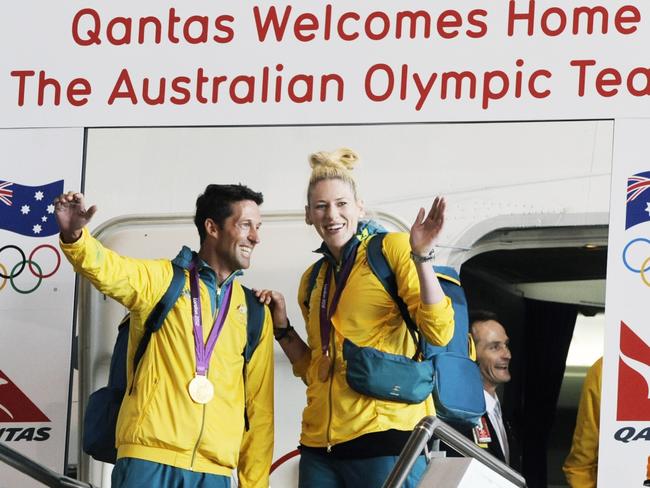 Olympians Malcolm Page and Lauren Jackson are welcomed home after the London Games in 2012. Picture: AAP Image/Mick Tsikas