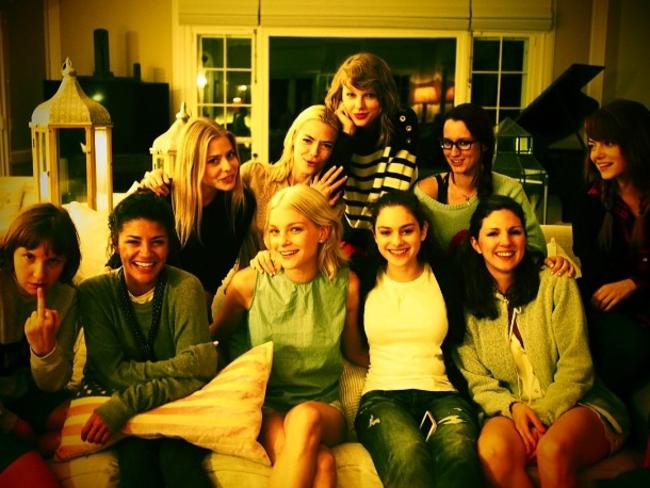 Taylor Swift’s family portrait, including Lena Dunham at far left and Emma Stone at far right.