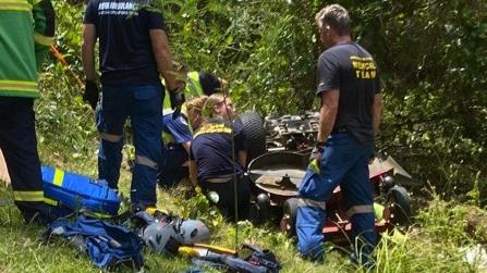 Paramedics and rescue crews worked for two hours to successfully free Stu Battle from underneath the mower. Picture: Supplied.