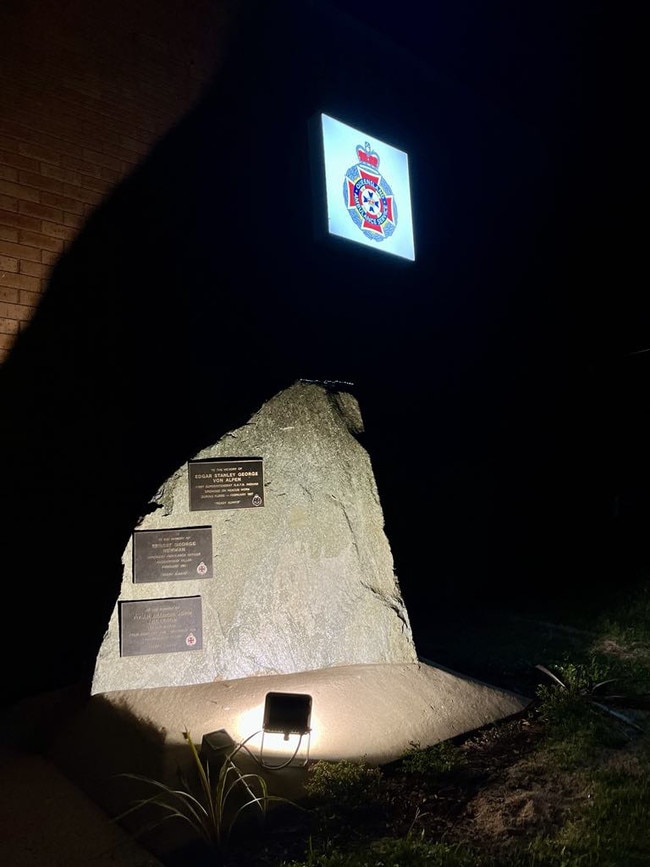 A memorial for three fallen officers outside the Ingham Ambulance Station in Hinchinbrook Shire. Picture: Cameron Bates