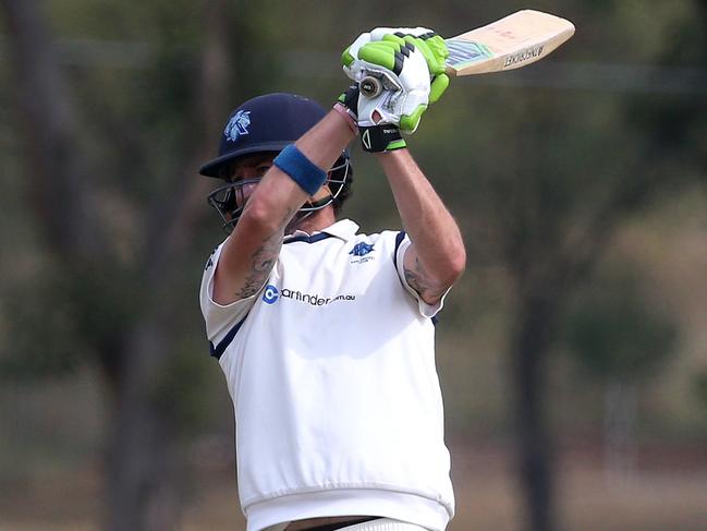 Justin Graham of Kew smashes a four down the ground during the VSDCA 1/4 final match between plenty valley and kew played at AK Line Reserve Watsonia on Saturday 5th March, 2016. Picture: Mark Dadswell