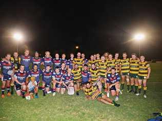 Warwick (blue and maroon) and Wattles (green and gold) players after the Cowboys won 22-18 in the Basil Nolan Memorial Shield game at Father Ranger Oval. Picture: Gerard Walsh