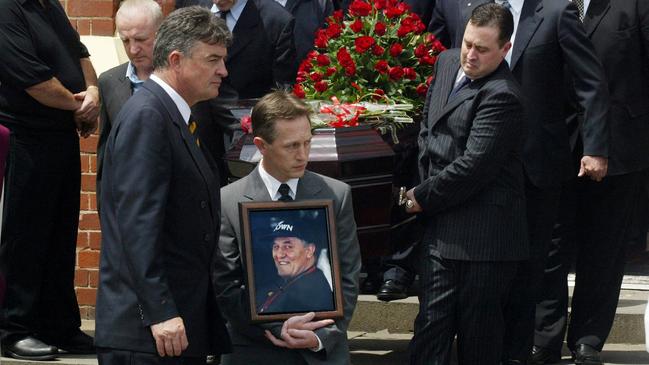 Grahamt Kinniburgh’s funeral. Brent Kinniburgh is pictured holding his dad’s photo. Picture: Peter Ward