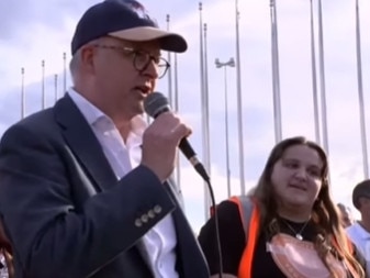 Prime Minister Anthony Albanese and No More rally organiser Sarah Williams.