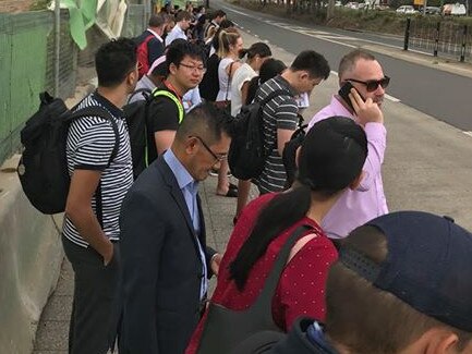 Huge line of people stuck waiting for buses this morning in Kellyville. Picture: Gav Lamb