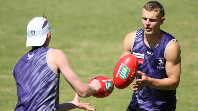 Brett Bewley (right) joins Dockers training this week.