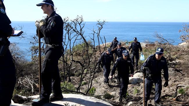 Police during a Manly clifftop search related to an alleged 1988 murder. Picture: Toby Zerna