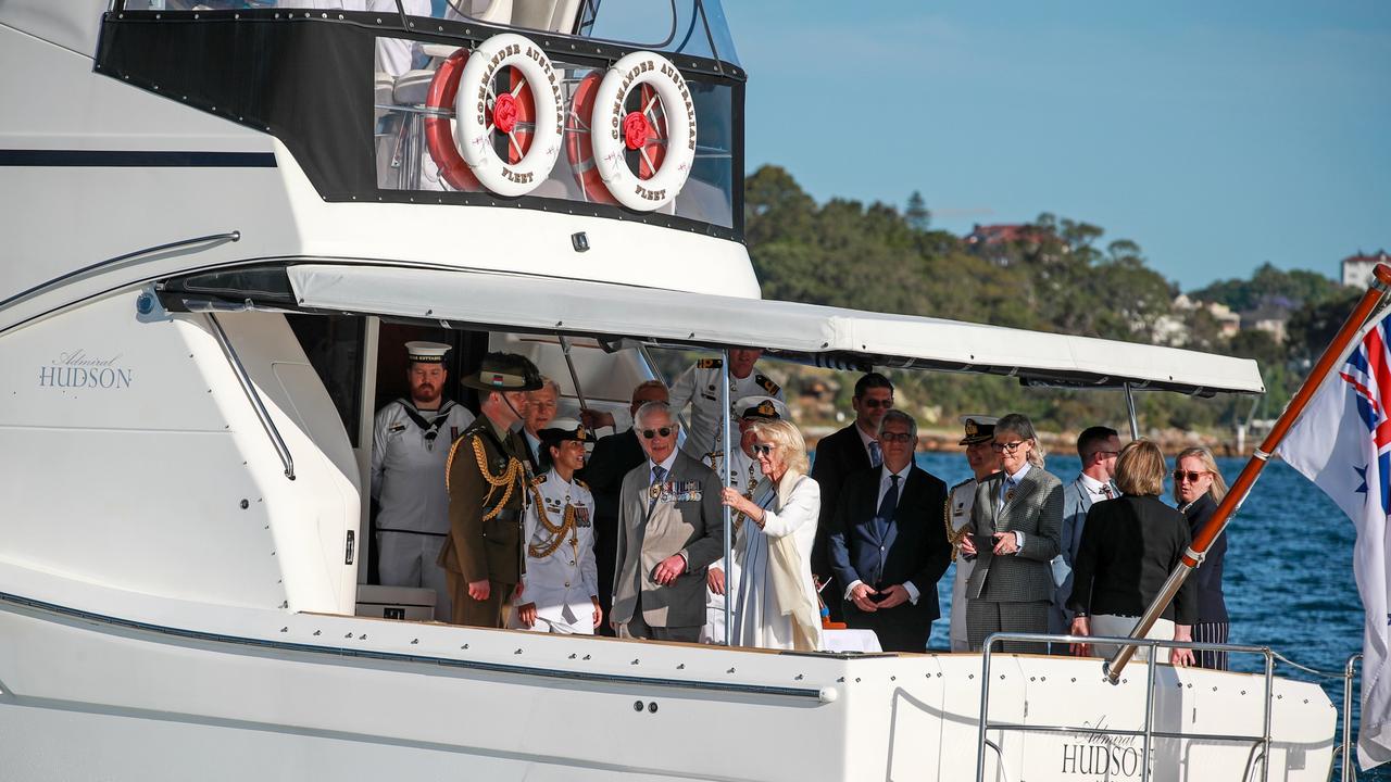 King Charles III and Queen Camilla, accompanied by Australia's Governor-General Sam Mostyn, stand aboard the Admiral Hudson naval vessel during a Navy Fleet review. Picture: Roni Bintang/Getty Images