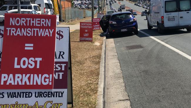 Signs placed along Gympie Rd, Kedron protesting against the Northern Transitway proposal. Picture: Darren Cartwright