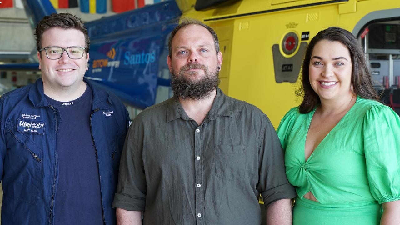 Flight doctor Matt Klan with past patient Zac Wells and his wife Heidi Glover-Wells.