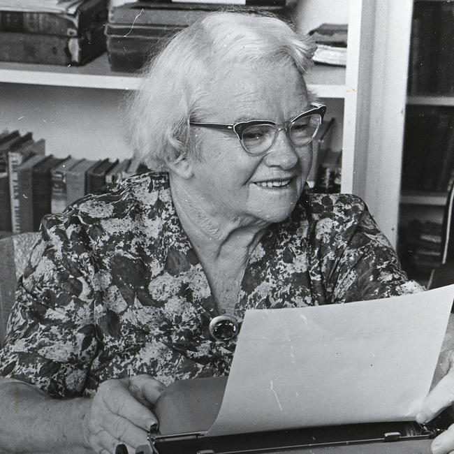 Alice Duncan-Kemp at home in Toowoomba, west of Brisbane, using a typewriter to record her memoirs.