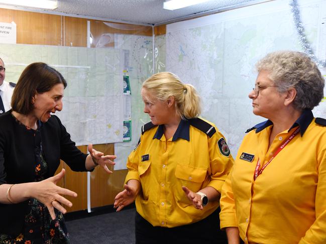 New South Wales Premier Gladys Berejiklian meets NSW Rural Fire Service volunteers Sue Jenkins (right) and Rowena Cunneen (centre). Picture: AAP