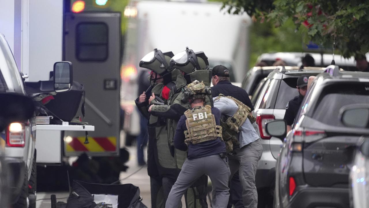 Law enforcement officials at the Pearl Street Mall, in Boulder. Picture: AP Photo/David Zalubowski