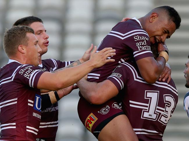 GOSFORD, AUSTRALIA - MARCH 02: Jake Trbojevic of the Manly Sea Eagles celebrates his try with team mates during the NRL Trial match between the Manly Sea Eagles and the Sydney Roosters at Central Coast Stadium on March 02, 2019 in Gosford, Australia. (Photo by Ashley Feder/Getty Images)