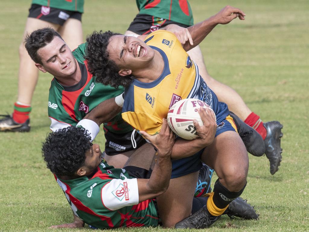 Zac Brown for Highfields tackled by Laurie Jocumsen for Pittsworth.