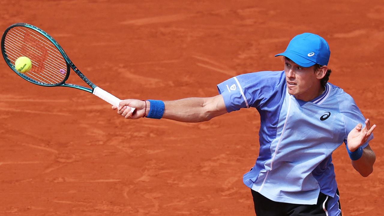 Australia's Alex de Minaur returns a forehand on the clay surface which has become his favourite type of court to play on. Picture: AFP