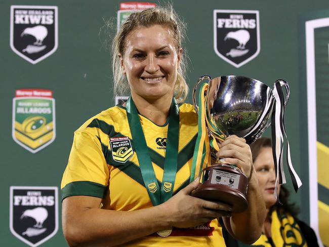 Ruan Sims with the trophy after victory during the women's ANZAC Test match.