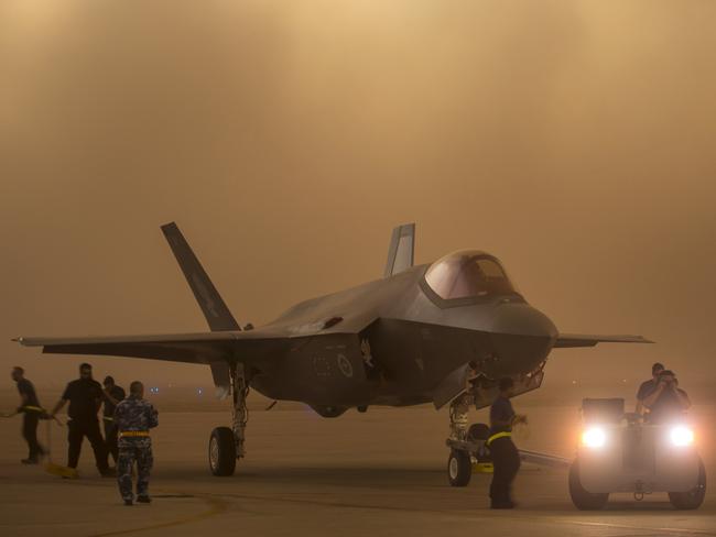 An Australian F-35A aircraft  is towed to cover during a sudden dust storm at Luke Air Force Base, Arizona. Picture: Defence