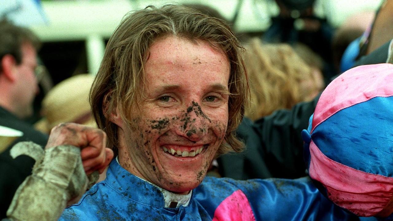 Winning jockey Damien Oliver unsaddles the Melbourne Cup winner Doriemus. 1995 Melbourne Cup. Picture: Supplied